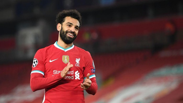 LIVERPOOL, ENGLAND - DECEMBER 01: Mohamed Salah of Liverpool reacts during the UEFA Champions League Group D stage match between Liverpool FC and Ajax Amsterdam at Anfield on December 01, 2020 in Liverpool, England. Sporting stadiums around the UK remain under strict restrictions due to the Coronavirus Pandemic as Government social distancing laws prohibit fans inside venues resulting in games being played behind closed doors. (Photo by Michael Regan/Getty Images)