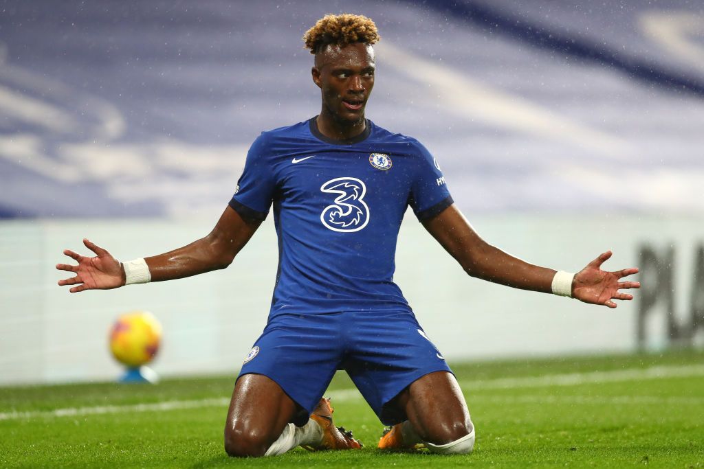 LONDON, ENGLAND - DECEMBER 21: Tammy Abraham of Chelsea celebrates after scoring their team's second goal during the Premier League match between Chelsea and West Ham United at Stamford Bridge on December 21, 2020 in London, England. The match will be played without fans, behind closed doors as a Covid-19 precaution. (Photo by Clive Rose/Getty Images)