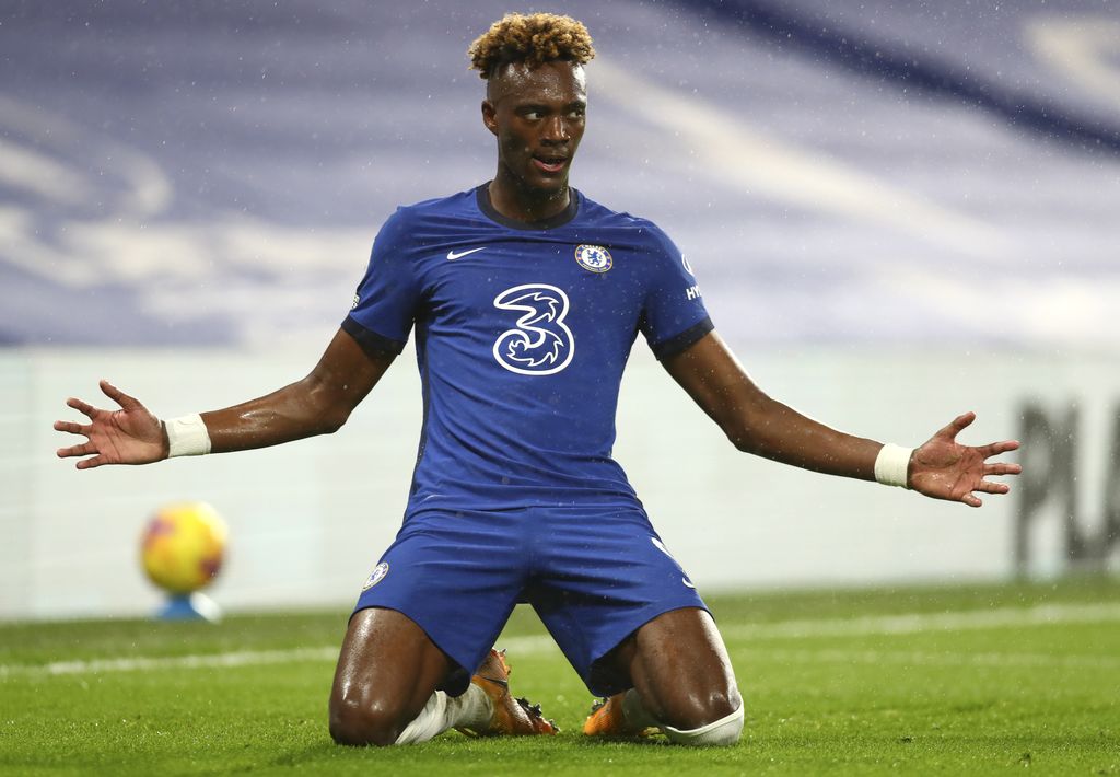 Chelsea's Tammy Abraham celebrates after scoring his team's second goal during the English Premier League soccer match between Chelsea and West Ham at Stamford Bridge, London, Monday, Dec. 21, 2020. (AP Photo/Clive Rose,Pool)