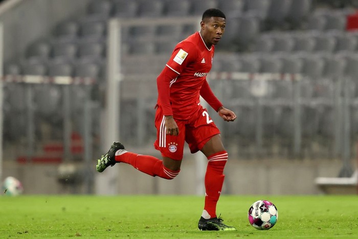 MUNICH, GERMANY - DECEMBER 16: David Alaba of FC Bayern München runs with the ball during the Bundesliga match between FC Bayern Muenchen and VfL Wolfsburg at Allianz Arena on December 16, 2020 in Munich, Germany. (Photo by Alexander Hassenstein/Getty Images)