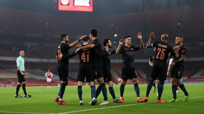 LONDON, ENGLAND - DECEMBER 22: Phil Foden of Manchester City celebrates scoring his sides third goal during the Carabao Cup Quarter Final match between Arsenal and Manchester City at Emirates Stadium on December 22, 2020 in London, England. The match will be played without fans, behind closed doors as a Covid-19 precaution. (Photo by Catherine Ivill/Getty Images)
