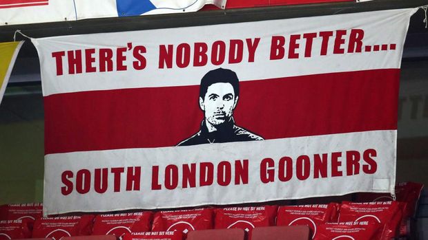 LONDON, ENGLAND - DECEMBER 22: A banner with an image of Mikel Arteta manager of Arsenal saying 'there's nobody better' in the stands during the Carabao Cup Quarter Final match between Arsenal and Manchester City at Emirates Stadium on December 22, 2020 in London, England. The match will be played without fans, behind closed doors as a Covid-19 precaution. (Photo by Catherine Ivill/Getty Images)