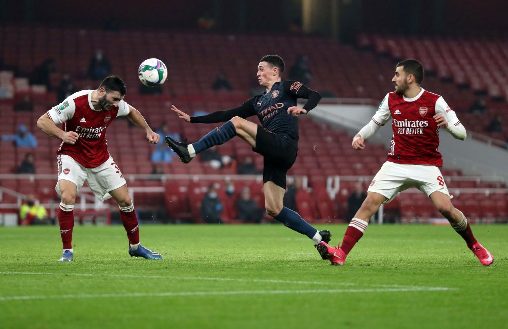 LONDON, ENGLAND - DECEMBER 22: Phil Foden of Manchester City celebrates after scoring their team's third goal during the Carabao Cup Quarter Final match between Arsenal and Manchester City at Emirates Stadium on December 22, 2020 in London, England. The match will be played without fans, behind closed doors as a Covid-19 precaution. (Photo by Catherine Ivill/Getty Images)