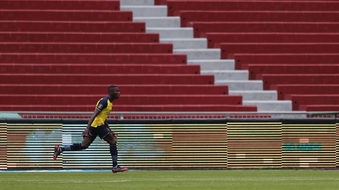 QUITO, ECUADOR - OCTOBER 13:  Moises Caicedo of Ecuador celebrates after scoring the opening goal during a match between Ecuador and Uruguay as part of South American Qualifiers for Qatar 2022 at Rodrigo Paz Delgado Stadium on October 13, 2020 in Quito, Ecuador. (Photo by Jose Jacome - Pool/Getty Images)