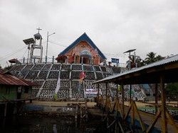 Gereja Unik di Papua, Salib Ditempatkan di Dalam Tempayan