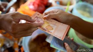 Foto: Belanja di Batas Negeri, Bisa Bayar Pakai Rupiah-Ringgit