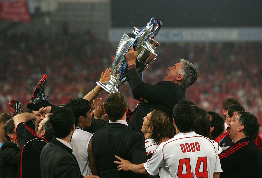 ATHENS, GREECE - MAY 23:  Carlo Ancelotti, the manager of AC Milan jolds the trophy aloft in celebration following his teams 2-1 victory during the UEFA Champions League Final match between Liverpool and AC Milan at the Olympic Stadium on May 23, 2007 in Athens, Greece.  (Photo by Alex Livesey/Getty Images)