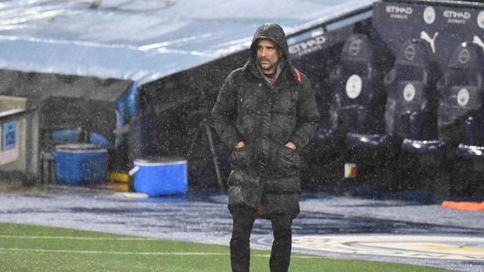MANCHESTER, ENGLAND - DECEMBER 26: Pep Guardiola, Manager of Manchester City looks on during the Premier League match between Manchester City and Newcastle United at Etihad Stadium on December 26, 2020 in Manchester, England. The match will be played without fans, behind closed doors as a Covid-19 precaution. (Photo by Peter Powell -Pool/Getty Images)