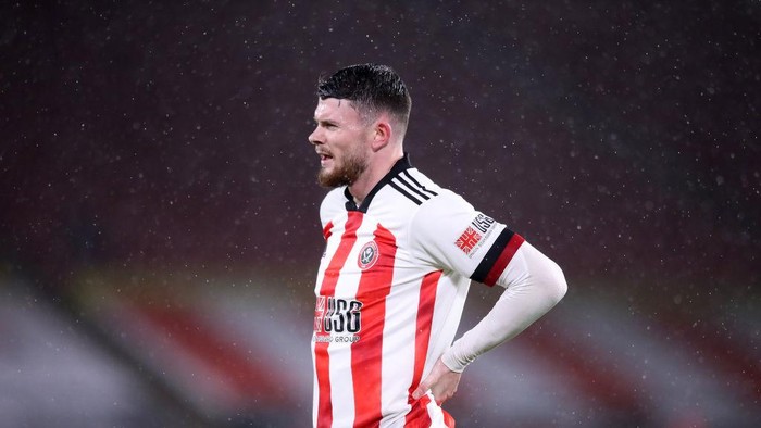 SHEFFIELD, ENGLAND - DECEMBER 26: Ollie Norwood of Sheffield United  during the Premier League match between Sheffield United and Everton at Bramall Lane on December 26, 2020 in Sheffield, England. The match will be played without fans, behind closed doors as a Covid-19 precaution. (Photo by Alex Pantling/Getty Images)