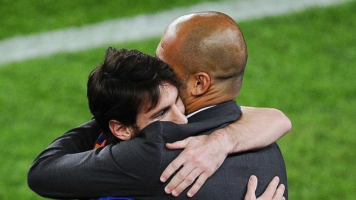 BARCELONA, SPAIN - MAY 05:  Lionel Messi of FC Barcelona (L) hugs his Head coach Josep Guardiola of FC Barcelona after scoring his teams third goal during the La Liga match between FC Barcelona and RCD Espanyol at Camp Nou on May 5, 2012 in Barcelona, Spain. This was Guardiolas last match.  (Photo by David Ramos/Getty Images)
