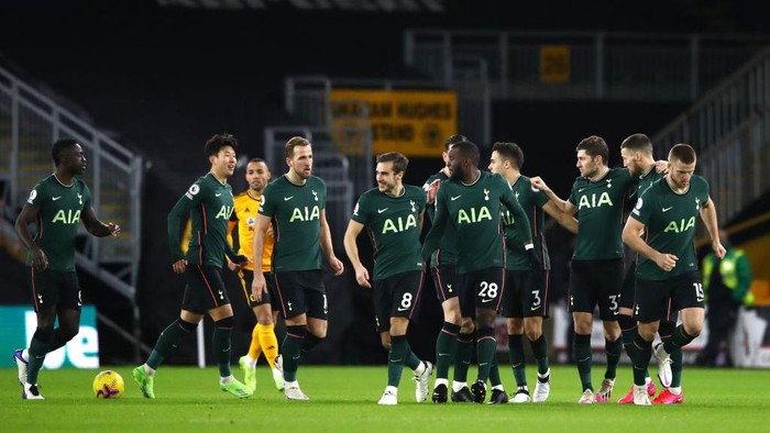 WOLVERHAMPTON, ENGLAND - DECEMBER 27:  Tanguy NDombele of Tottenham Hotspur celebrates with teammates  after scoring their teams first goal during the Premier League match between Wolverhampton Wanderers and Tottenham Hotspur at Molineux on December 27, 2020 in Wolverhampton, England. The match will be played without fans, behind closed doors as a Covid-19 precaution. (Photo by Michael Steele/Getty Images)