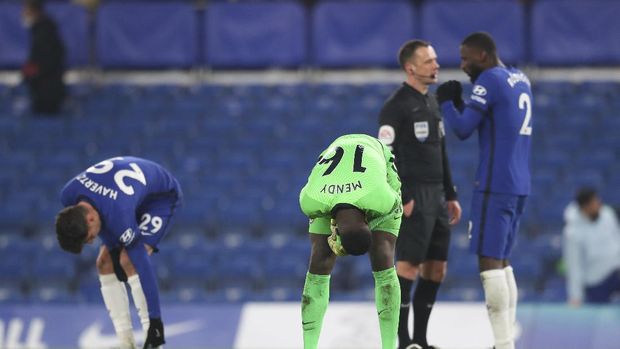 Chelsea's goalkeeper Edouard Mendy is seen at the end of the English Premier League soccer match between Chelsea and Aston Villa in London, England, Monday, Dec. 28, 2020. (Catherine Ivill/Pool via AP)