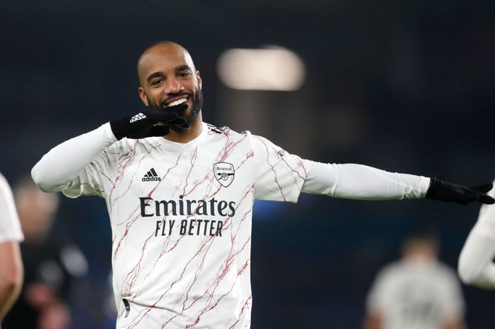 Alexandre Lacazette BRIGHTON, ENGLAND - DECEMBER 29: Alexandre Lacazette of Arsenal celebrates after scoring his team's first goal during the Premier League match between Brighton & Hove Albion and Arsenal at American Express Community Stadium on December 29, 2020 in Brighton, England. The match will be played without fans, behind closed doors as a Covid-19 precaution. (Photo by Frank Augstein - Pool/Getty Images)