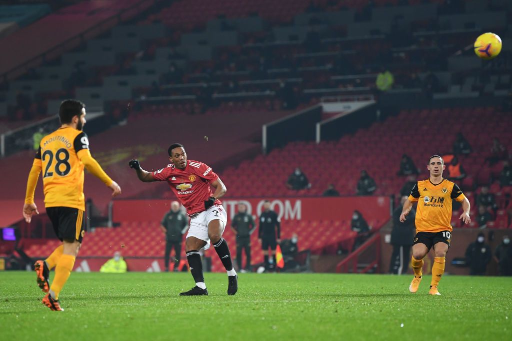 MANCHESTER, ENGLAND - DECEMBER 29: Marcus Rashford of Manchester United celebrates after scoring his team's first goal during the Premier League match between Manchester United and Wolverhampton Wanderers at Old Trafford on December 29, 2020 in Manchester, England. The match will be played without fans, behind closed doors as a Covid-19 precaution. (Photo by Michael Regan/Getty Images)