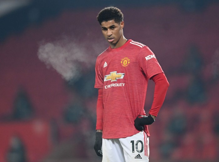 MANCHESTER, ENGLAND - DECEMBER 29: Marcus Rashford of Manchester United looks on during the Premier League match between Manchester United and Wolverhampton Wanderers at Old Trafford on December 29, 2020 in Manchester, England. The match will be played without fans, behind closed doors as a Covid-19 precaution. (Photo by Michael Regan/Getty Images)