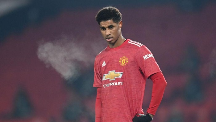 MANCHESTER, ENGLAND - DECEMBER 29: Marcus Rashford of Manchester United looks on during the Premier League match between Manchester United and Wolverhampton Wanderers at Old Trafford on December 29, 2020 in Manchester, England. The match will be played without fans, behind closed doors as a Covid-19 precaution. (Photo by Michael Regan/Getty Images)