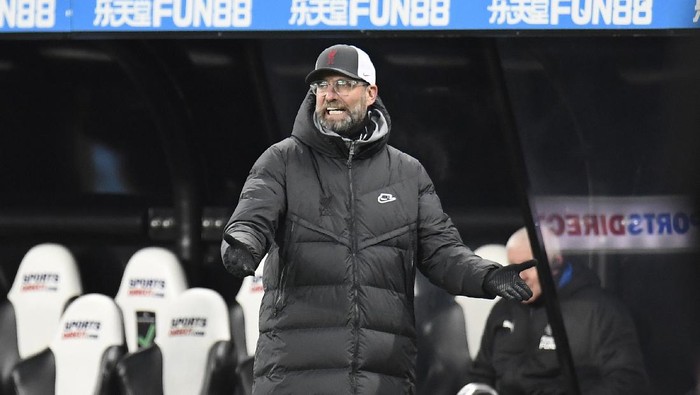 Liverpools manager Jurgen Klopp gestures from the sidelines during the English Premier League soccer match between Newcastle United and Liverpool at St James Park stadium in Newcastle, England, Wednesday, Dec. 30, 2020. (Peter Powell/ Pool via AP)