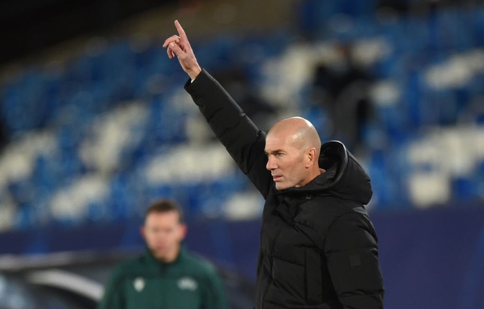 MADRID, SPAIN - DECEMBER 09: Zinedine Zidane, head coach of Real Madrid reacts during the UEFA Champions League Group B stage match between Real Madrid and Borussia Moenchengladbach at Estadio Alfredo di Stefano on December 09, 2020 in Madrid, Spain. Sporting stadiums around Spain remain under strict restrictions due to the Coronavirus Pandemic as Government social distancing laws prohibit fans inside venues resulting in games being played behind closed doors. (Photo by Denis Doyle/Getty Images)
