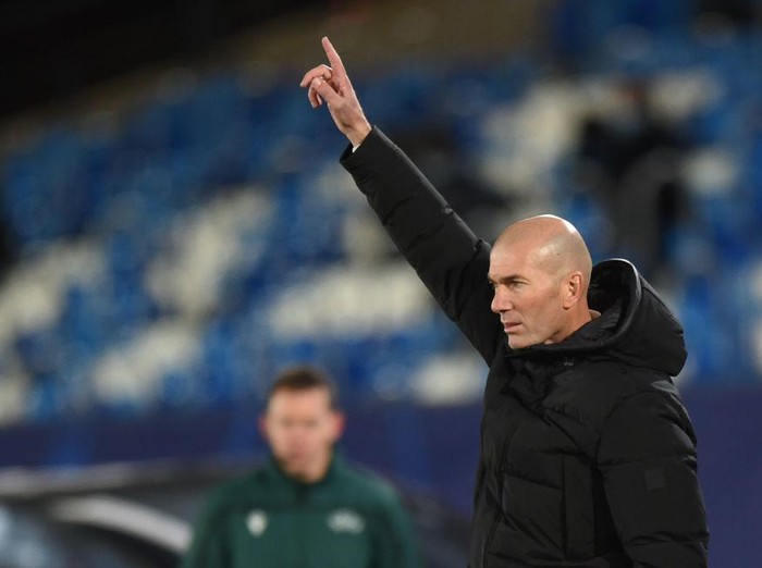 MADRID, SPAIN - DECEMBER 09: Zinedine Zidane, head coach of Real Madrid reacts during the UEFA Champions League Group B stage match between Real Madrid and Borussia Moenchengladbach at Estadio Alfredo di Stefano on December 09, 2020 in Madrid, Spain. Sporting stadiums around Spain remain under strict restrictions due to the Coronavirus Pandemic as Government social distancing laws prohibit fans inside venues resulting in games being played behind closed doors. (Photo by Denis Doyle/Getty Images)
