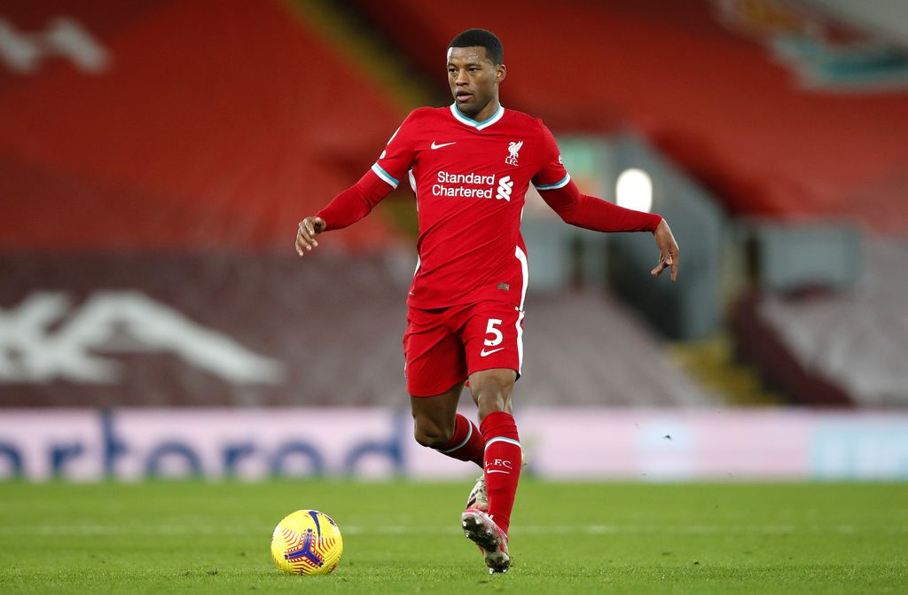 LIVERPOOL, ENGLAND - DECEMBER 27: Georginio Wijnaldum of Liverpool runs with the ball during the Premier League match between Liverpool and West Bromwich Albion at Anfield on December 27, 2020 in Liverpool, England. A limited number of fans (2000) are welcomed back to stadiums to watch elite football across England. This was following easing of restrictions on spectators in tiers one and two areas only. (Photo by Clive Brunskill/Getty Images)