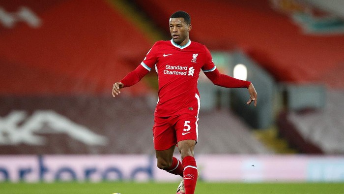 LIVERPOOL, ENGLAND - DECEMBER 27: Georginio Wijnaldum of Liverpool runs with the ball during the Premier League match between Liverpool and West Bromwich Albion at Anfield on December 27, 2020 in Liverpool, England. A limited number of fans (2000) are welcomed back to stadiums to watch elite football across England. This was following easing of restrictions on spectators in tiers one and two areas only. (Photo by Clive Brunskill/Getty Images)