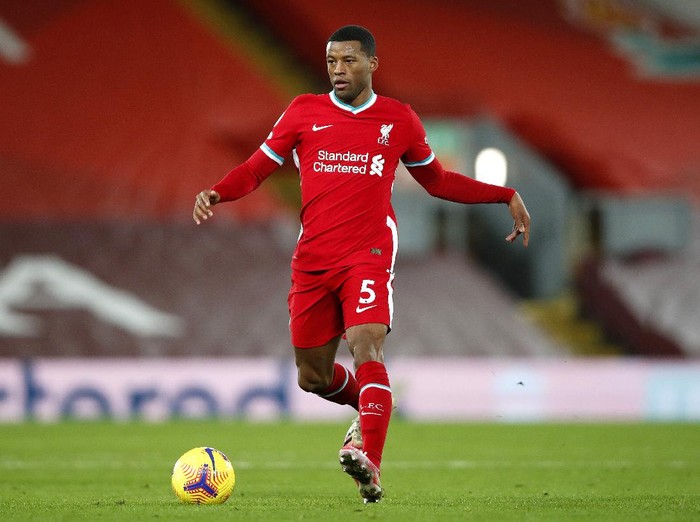 LIVERPOOL, ENGLAND - DECEMBER 27: Georginio Wijnaldum of Liverpool runs with the ball during the Premier League match between Liverpool and West Bromwich Albion at Anfield on December 27, 2020 in Liverpool, England. A limited number of fans (2000) are welcomed back to stadiums to watch elite football across England. This was following easing of restrictions on spectators in tiers one and two areas only. (Photo by Clive Brunskill/Getty Images)