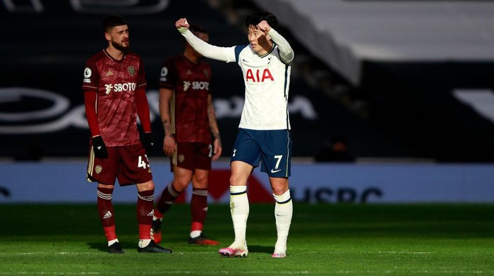 LONDON, ENGLAND - JANUARY 02: Son Heung-Min of Tottenham Hotspur celebrates after scoring their teams second goal during the Premier League match between Tottenham Hotspur and Leeds United at Tottenham Hotspur Stadium on January 02, 2021 in London, England. The match will be played without fans, behind closed doors as a Covid-19 precaution. (Photo by Ian Walton - Pool/Getty Images)