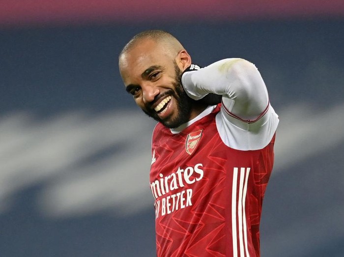 WEST BROMWICH, ENGLAND - JANUARY 02: Alexandre Lacazette of Arsenal celebrates after scoring their team's fourth goal during the Premier League match between West Bromwich Albion and Arsenal at The Hawthorns on January 02, 2021 in West Bromwich, England. The match will be played without fans, behind closed doors as a Covid-19 precaution. (Photo by Michael Regan/Getty Images)