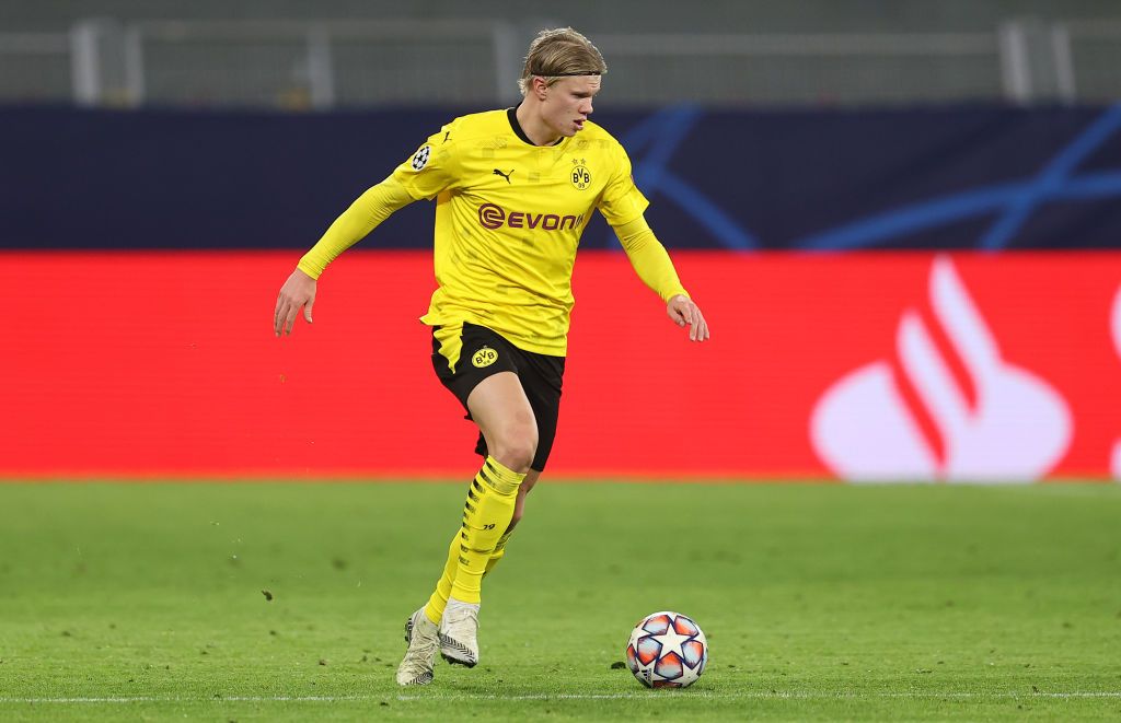 DORTMUND, GERMANY - NOVEMBER 24: Erling Haaland of Dortmund runs with the ball during the UEFA Champions League Group F stage match between Borussia Dortmund and Club Brugge KV at Signal Iduna Park on November 24, 2020 in Dortmund, Germany. (Photo by Lars Baron/Getty Images)