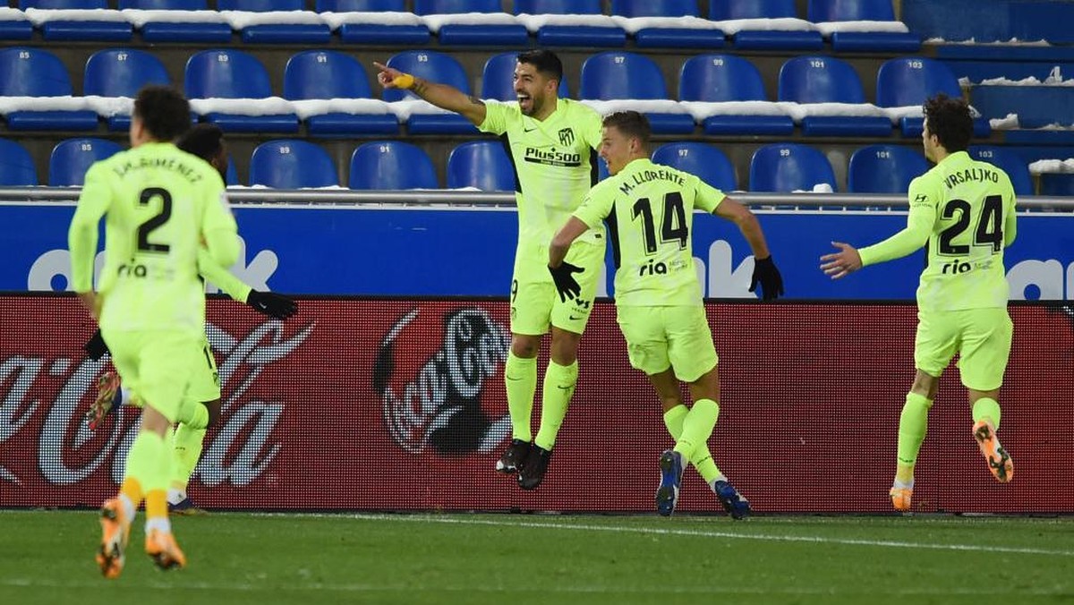 Luis Suarez mencetak gol penentu kemenangan Atletico. Foto: Getty Images/Denis Doyle