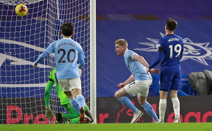Manchester Citys Kevin De Bruyne reacts after scoring his sides third goal during the English Premier League soccer match between Chelsea and Manchester City at Stamford Bridge, London, England, Sunday, Jan. 3, 2021. (AP Photo/Ian Walton/Pool)