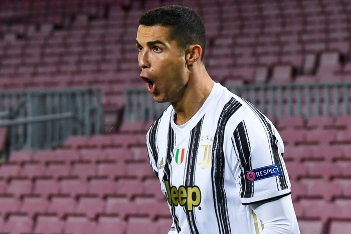Cristiano Ronaldo BARCELONA, SPAIN - DECEMBER 08: Cristiano Ronaldo of Juventus F.C. celebrates after scoring their team's first goal from the penalty spot during the UEFA Champions League Group G stage match between FC Barcelona and Juventus at Camp Nou on December 08, 2020 in Barcelona, Spain. Sporting stadiums around Spain remain under strict restrictions due to the Coronavirus Pandemic as Government social distancing laws prohibit fans inside venues resulting in games being played behind closed doors. (Photo by David Ramos/Getty Images)
