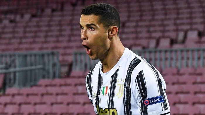 BARCELONA, SPAIN - DECEMBER 08: Cristiano Ronaldo of Juventus F.C. celebrates after scoring their teams first goal from the penalty spot during the UEFA Champions League Group G stage match between FC Barcelona and Juventus at Camp Nou on December 08, 2020 in Barcelona, Spain. Sporting stadiums around Spain remain under strict restrictions due to the Coronavirus Pandemic as Government social distancing laws prohibit fans inside venues resulting in games being played behind closed doors.  (Photo by David Ramos/Getty Images)
