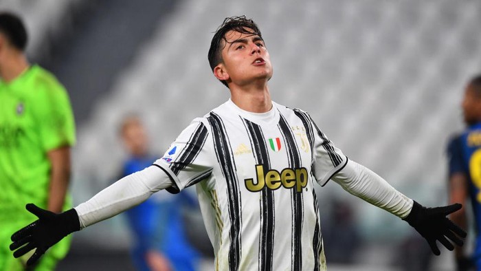 TURIN, ITALY - JANUARY 03: Paulo Dybala of Juventus F.C. celebrates after scoring their teams fourth goal during the Serie A match between Juventus and Udinese Calcio at Allianz Stadium on January 03, 2021 in Turin, Italy. Sporting stadiums around Italy remain under strict restrictions due to the Coronavirus Pandemic as Government social distancing laws prohibit fans inside venues resulting in games being played behind closed doors. (Photo by Valerio Pennicino/Getty Images)