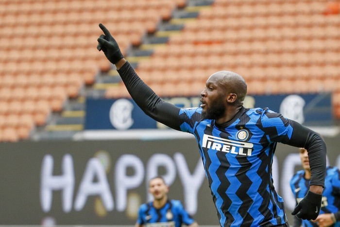 Inter Milans Romelu Lukaku celebrates after he scored his sides fourth goal during the Serie A soccer match between Inter Milan and Crotone at the San Siro Stadium in Milan, Italy, Sunday, Jan. 3, 2021. (AP Photo/Antonio Calanni)