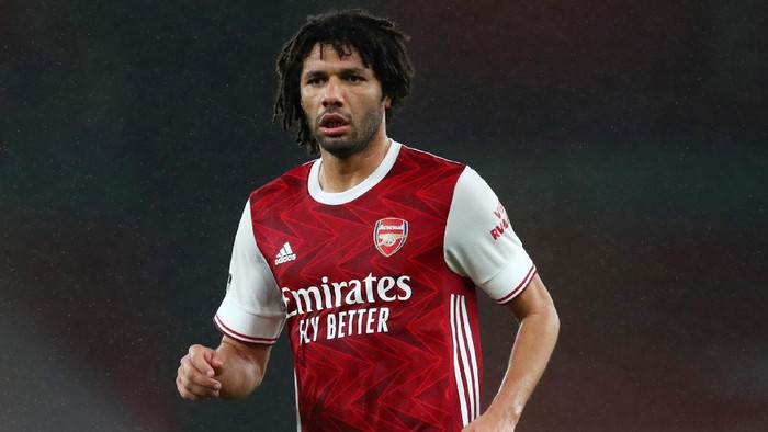 LONDON, ENGLAND - DECEMBER 13: Mohamed Elneny of Arsenal during the Premier League match between Arsenal and Burnley at Emirates Stadium on December 13, 2020 in London, England. A limited number of spectators (2000) are welcomed back to stadiums to watch elite football across England. This was following easing of restrictions on spectators in tiers one and two areas only. (Photo by Catherine Ivill/Getty Images )