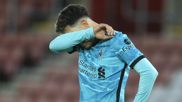 Liverpool's Roberto Firmino reacts following the English Premier League soccer match between Southampton and Liverpool at St Mary's Stadium, Southampton, England, Monday, Jan. 4, 2021. (AP Photo/Adam Davy,Pool)