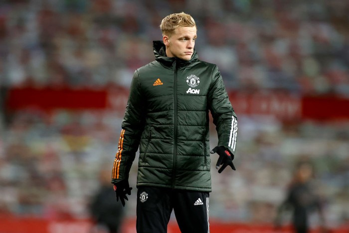 MANCHESTER, ENGLAND - DECEMBER 12: Donny Van De Beek of Manchester United looks on during the warm up prior to the Premier League match between Manchester United and Manchester City at Old Trafford on December 12, 2020 in Manchester, England. The match will be played without fans, behind closed doors as a Covid-19 precaution. (Photo by Phil Noble - Pool/Getty Images)