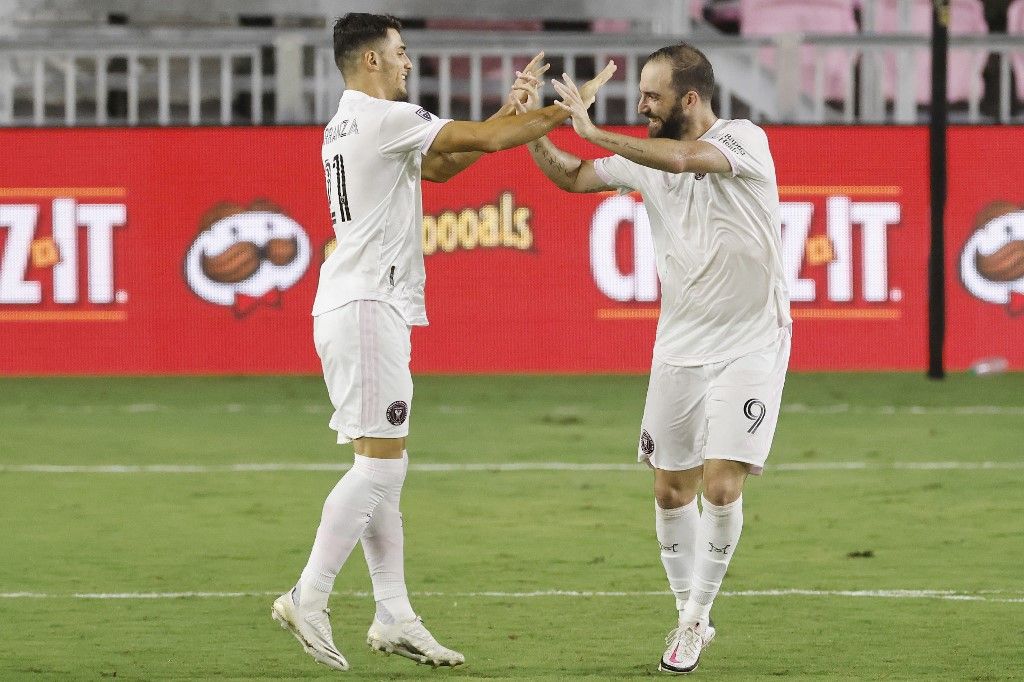 FORT LAUDERDALE, FLORIDA - OCTOBER 03: Julian Carranza #21 of Inter Miami CF celebrates with Gonzalo Higuain #9 after scoring a goal was disallowed after a review ruled it offside against New York City FC at Inter Miami CF Stadium on October 03, 2020 in Fort Lauderdale, Florida.   Michael Reaves/Getty Images/AFP