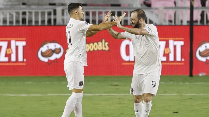 FORT LAUDERDALE, FLORIDA - OCTOBER 03: Julian Carranza #21 of Inter Miami CF celebrates with Gonzalo Higuain #9 after scoring a goal was disallowed after a review ruled it offside against New York City FC at Inter Miami CF Stadium on October 03, 2020 in Fort Lauderdale, Florida.   Michael Reaves/Getty Images/AFP