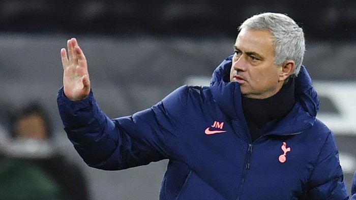 Tottenhams manager Jose Mourinho gestures as his team won the EFL Cup semi-final soccer match between Tottenham Hotspur and Brentford at Tottenham Hotspur Stadium in London, England, Tuesday, Jan. 5, 2021. (Glyn Kirk/Pool via AP)