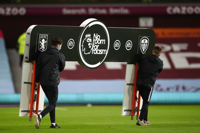 BIRMINGHAM, ENGLAND - OCTOBER 23: The Premier League handshake board is seen with the No Room For Racism logo prior to the Premier League match between Aston Villa and Leeds United at Villa Park on October 23, 2020 in Birmingham, England. Sporting stadiums around the UK remain under strict restrictions due to the Coronavirus Pandemic as Government social distancing laws prohibit fans inside venues resulting in games being played behind closed doors. (Photo by Michael Steele/Getty Images)