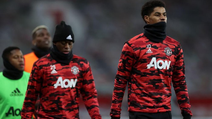 MANCHESTER, ENGLAND - JANUARY 01: Marcus Rashford of Manchester United warms up prior to the Premier League match between Manchester United and Aston Villa at Old Trafford on January 01, 2021 in Manchester, England. The match will be played without fans, behind closed doors as a Covid-19 precaution. (Photo by Carl Recine - Pool/Getty Images)