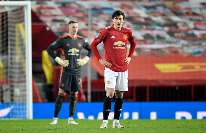 MANCHESTER, ENGLAND - JANUARY 06: Victor Lindelof of Manchester United reacts during the Carabao Cup Semi Final match between Manchester United and Manchester City at Old Trafford on January 06, 2021 in Manchester, England. The match will be played without fans, behind closed doors as a Covid-19 precaution. (Photo by Peter Powell - Pool/Getty Images)