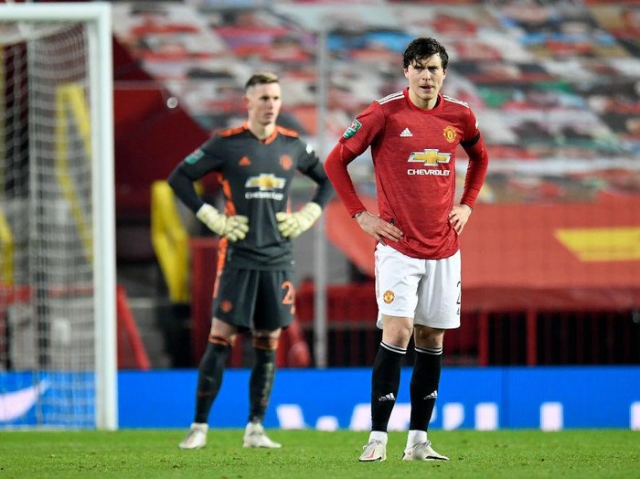 MANCHESTER, ENGLAND - JANUARY 06: Victor Lindelof of Manchester United reacts during the Carabao Cup Semi Final match between Manchester United and Manchester City at Old Trafford on January 06, 2021 in Manchester, England. The match will be played without fans, behind closed doors as a Covid-19 precaution. (Photo by Peter Powell - Pool/Getty Images)