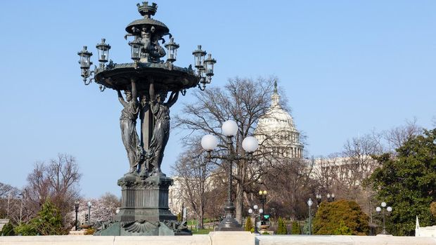 Capitol Hill Washington Close up of Bartholdi fountain and Capitol in Washington DC. Bartholdi died in 1904