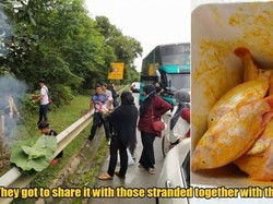 Terjebak Macet, Pasangan Ini Malah Bakar Ikan di Pinggir Jalan