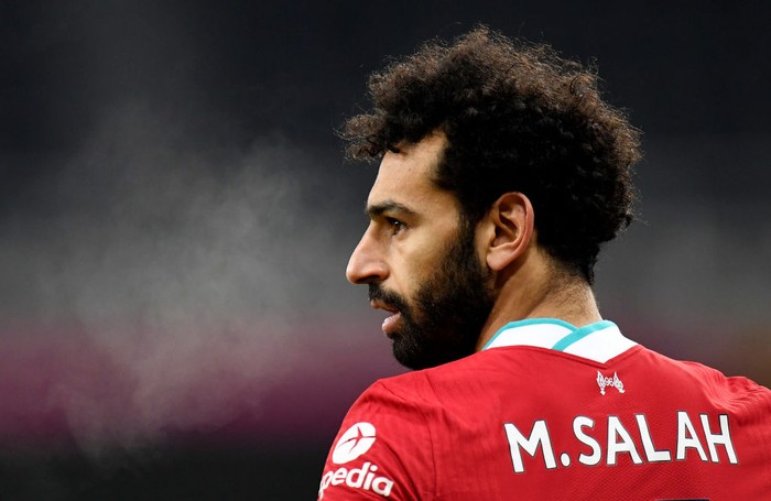 NEWCASTLE UPON TYNE, ENGLAND - DECEMBER 30: Mohamed Salah of Liverpool looks on during the Premier League match between Newcastle United and Liverpool at St. James Park on December 30, 2020 in Newcastle upon Tyne, England. The match will be played without fans, behind closed doors as a Covid-19 precaution. (Photo by Peter Powell - Pool/Getty Images)