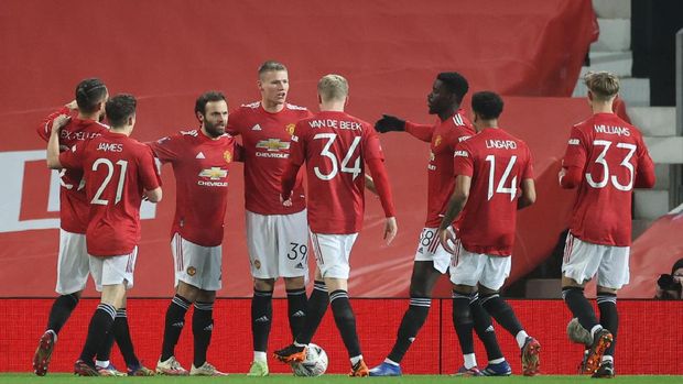 Soccer Football - FA Cup - Third Round - Manchester United v Watford - Old Trafford, Manchester, Britain - January 9, 2021 Manchester United's Scott McTominay celebrates scoring their first goal with teammates Action Images via Reuters/Carl Recine