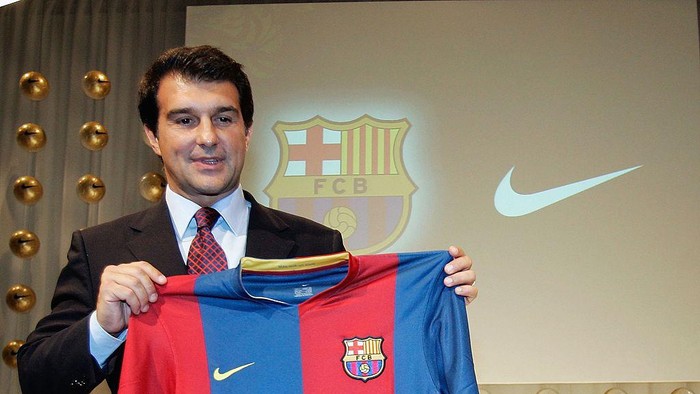 FRANKFURT, GERMANY - JUNE 21:  FC Barcelona President Joan Laporta reveals home shirt for the 2006/07 season during a press conference on June 21, 2006 in Frankfurt, Germany. The Away kit is inspired by the orange kit worn by Barcelonas 1992 European Cup winning team. (Photo by Jan Pitman/Getty Images)